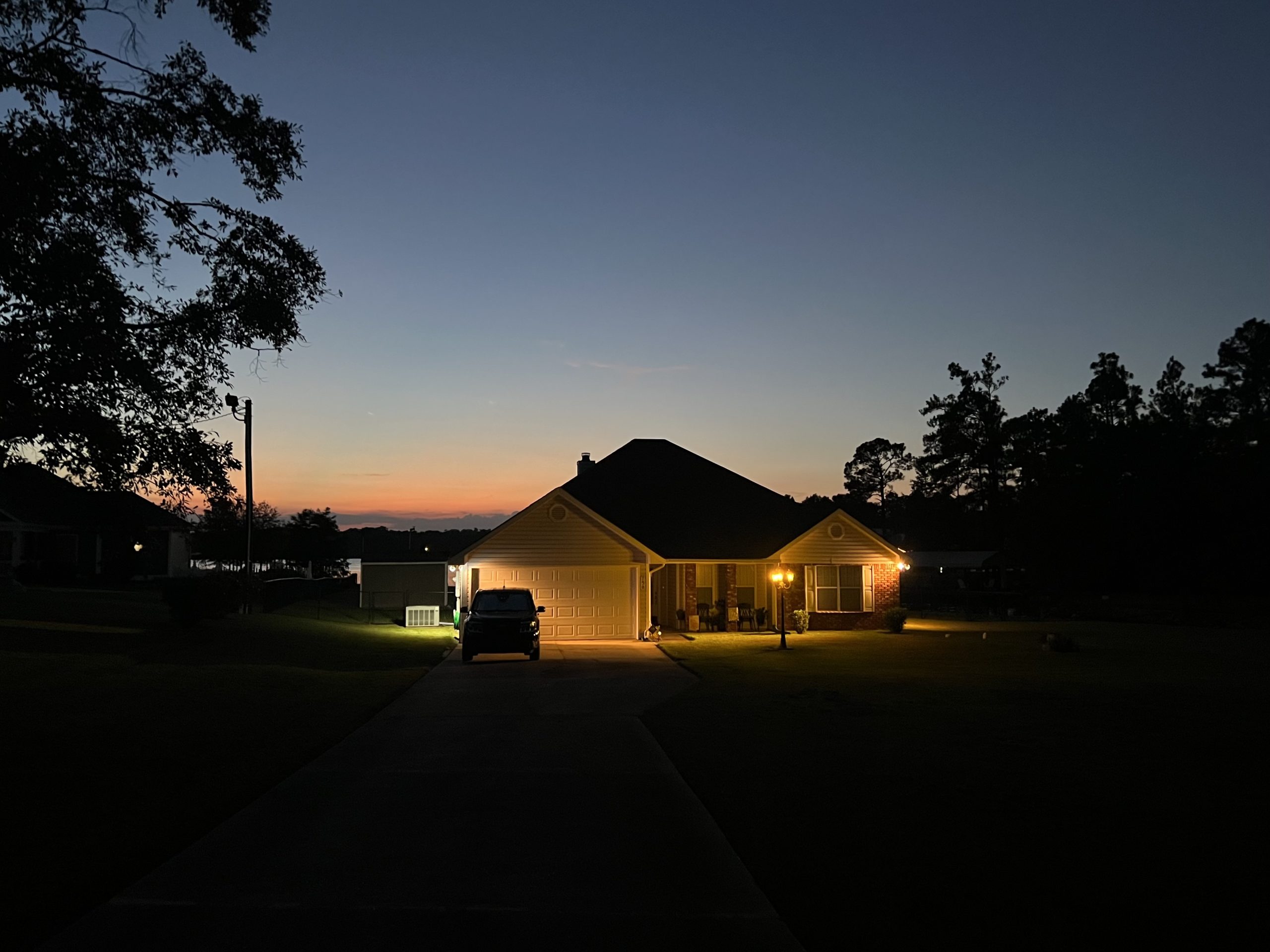 Night shot of floodlights on a home